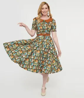 1950s Brown Book Print Brenda Swing Dress by Collectif