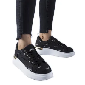 Black platform sneakers by Osson