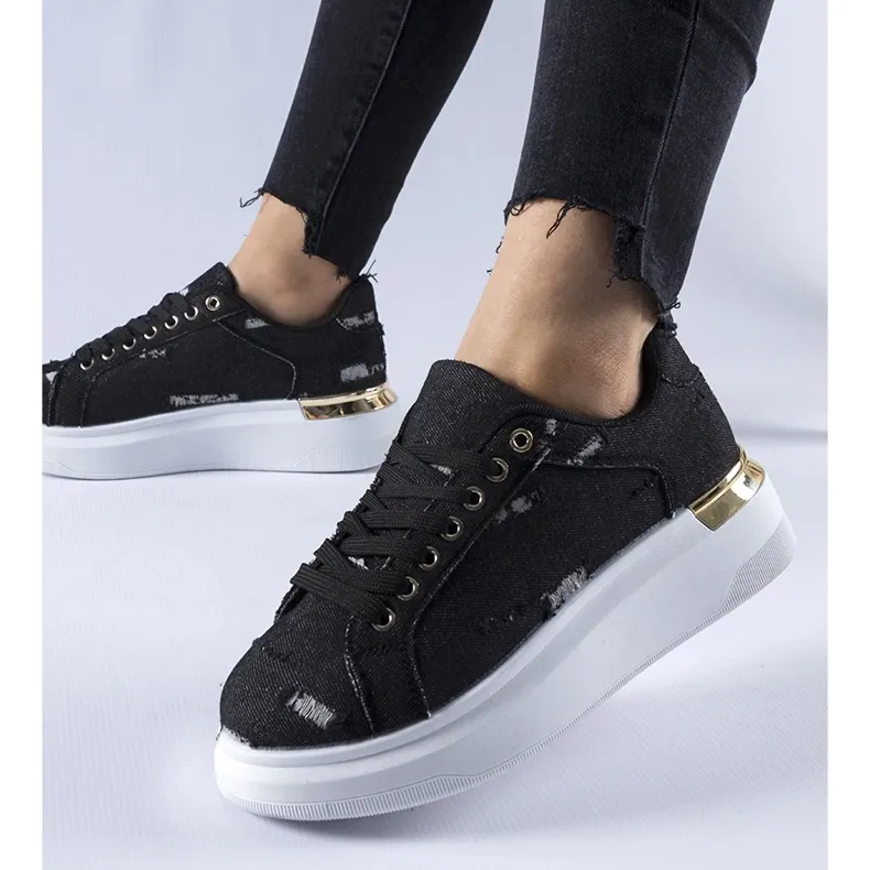 Black platform sneakers by Osson