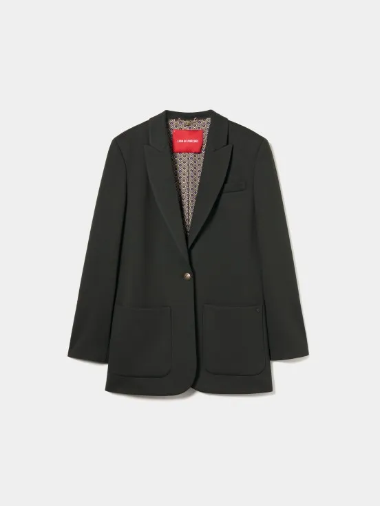 Stylish blazer featuring functional pockets and eye-catching contrasting lining